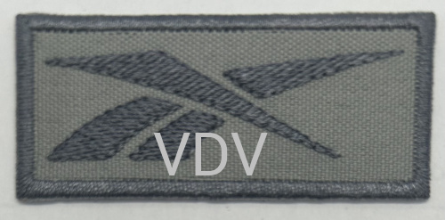 ТА-Г-Reebok Термоаплікація клейова 62х27 мм, сірий з т. сірою ниткою (уп. 5 шт)